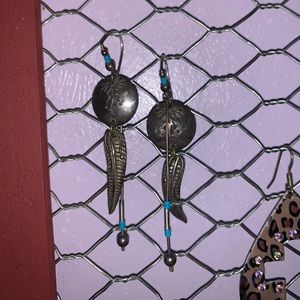 Selling my sterling silver earrings with feather dangle and turquoise